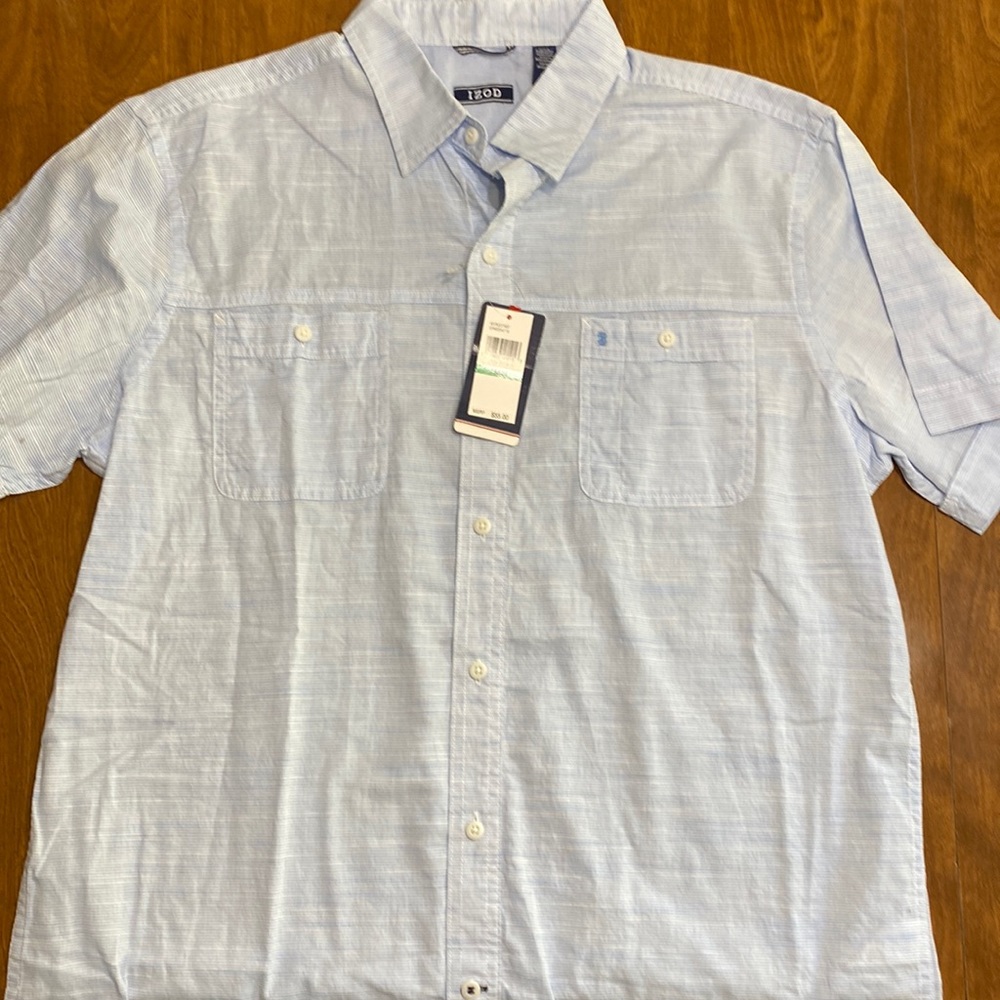 Izod short sleeve baby blue button up. Never worn with tags